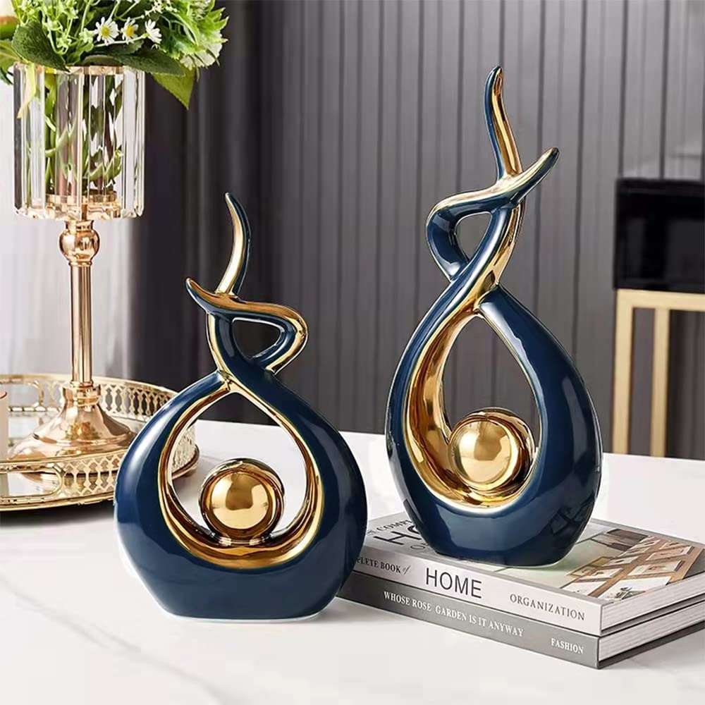 Decor and ornaments – abstract ceramic sculpture with gold detail