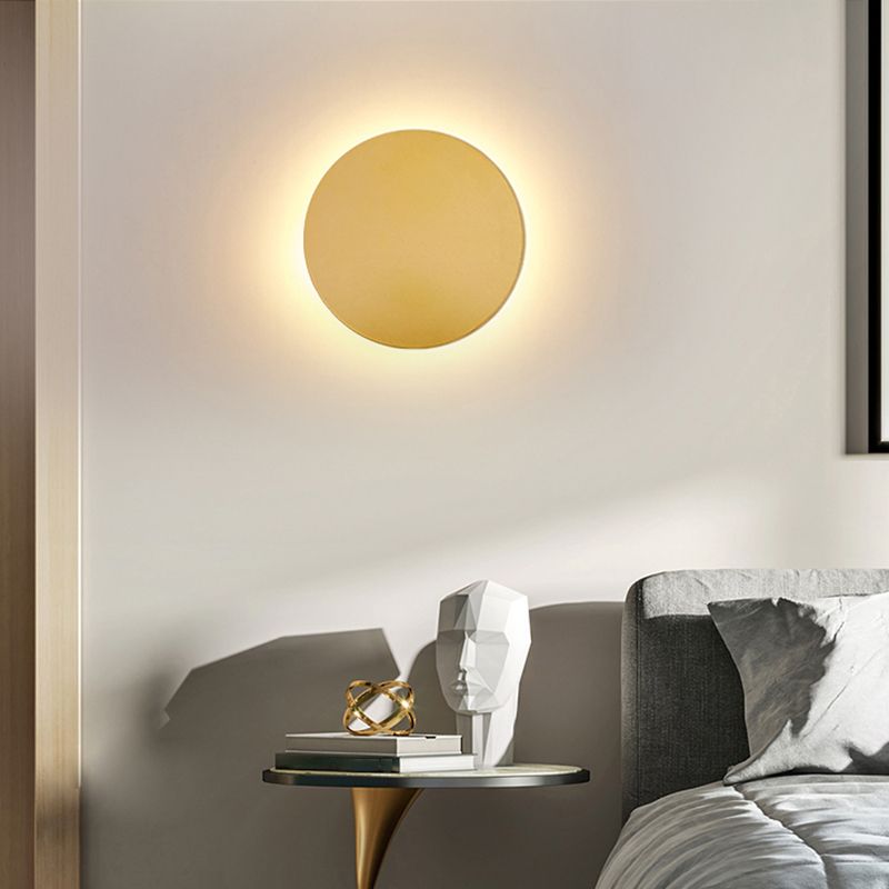 Minimalist round wall sconce with halo LED illumination by BROKLEN