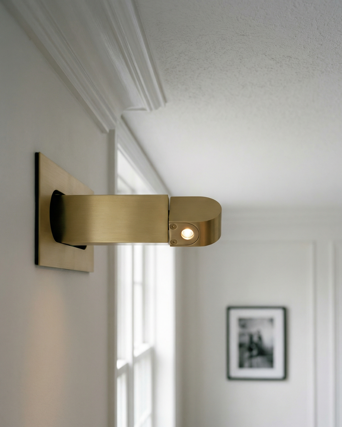 Minimalist semi-circle Nordic wall light in gold and dark grey by BROKLEN – view 2