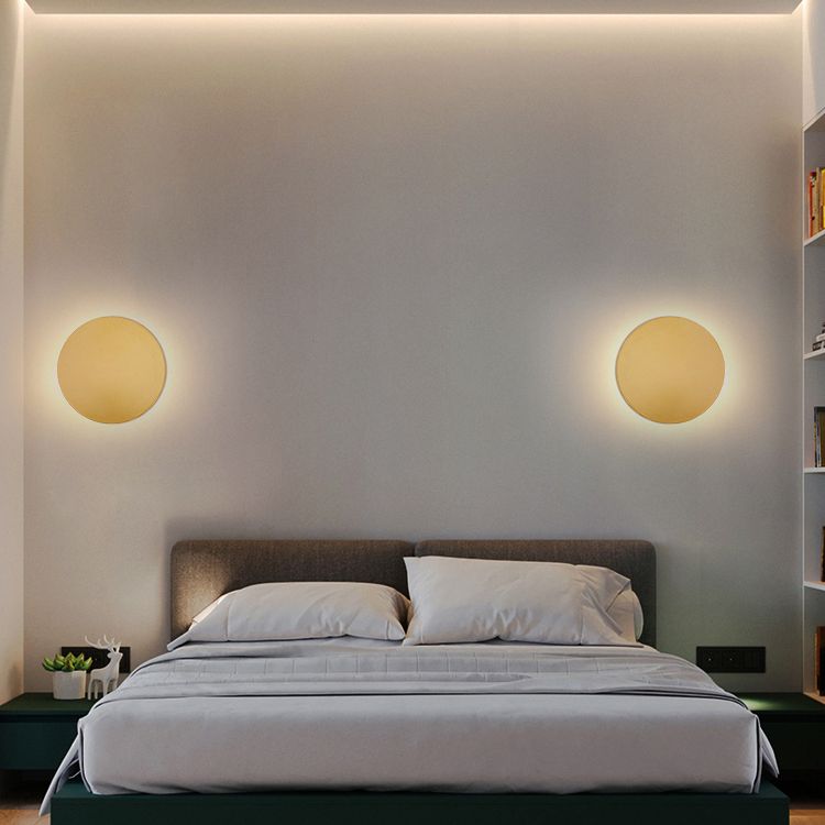 Minimalist round wall sconce with halo LED illumination by BROKLEN – view 2