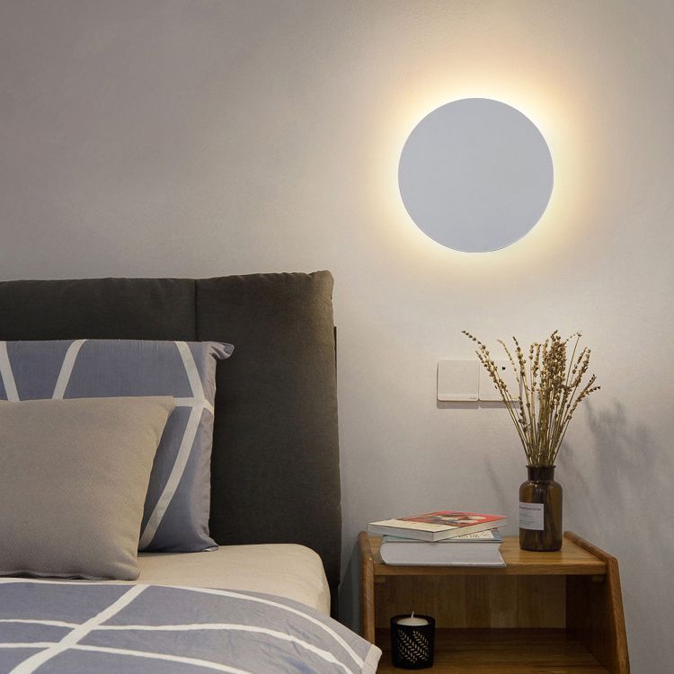Minimalist round wall sconce with halo LED illumination by BROKLEN – view 5