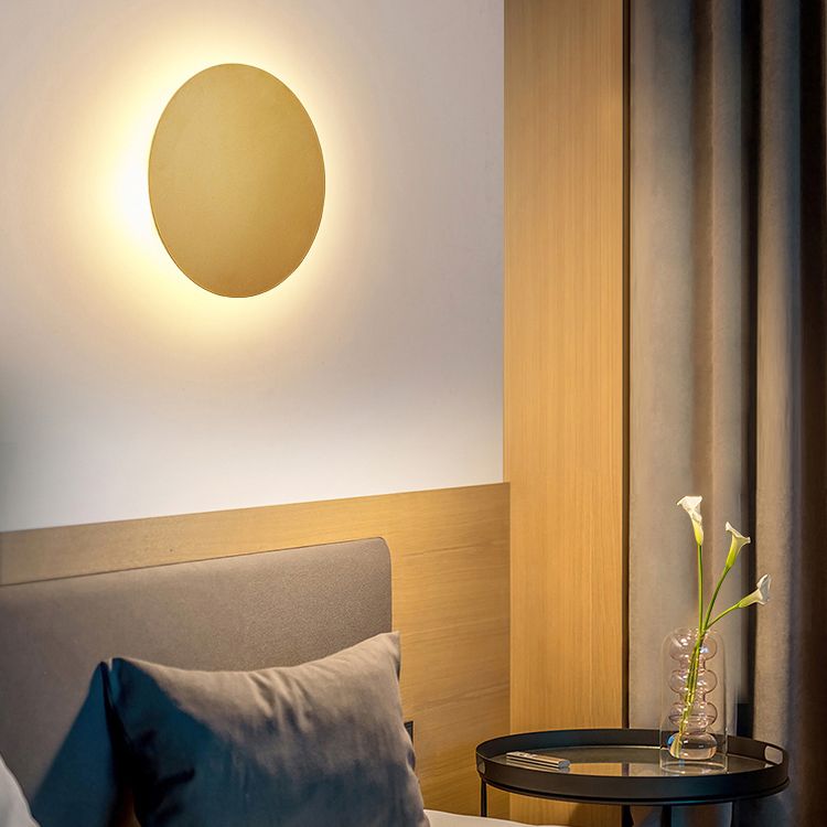 Minimalist round wall sconce with halo LED illumination by BROKLEN – view 6