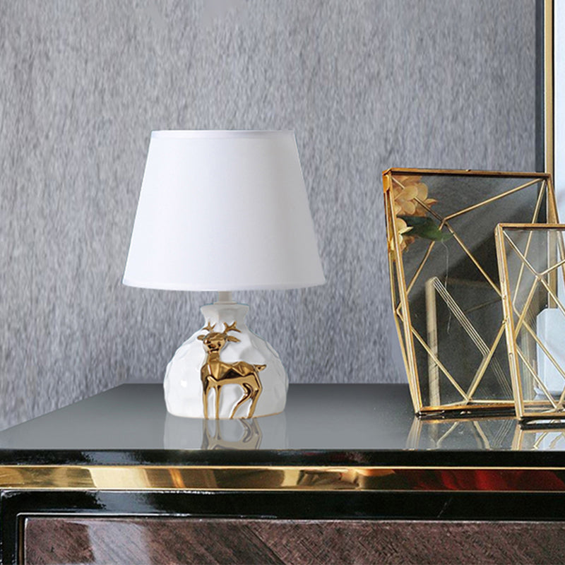 Deer ornament table lamp with classic fabric shade by BROKLEN