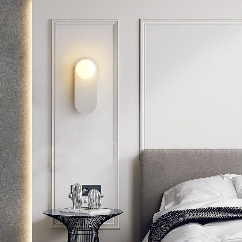 Minimalist Nordic globe wall sconce with oval backplate by BROKLEN – view 6