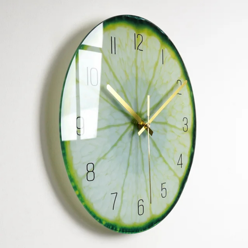 Vibrant glass wall clock with golden hands and number markers by BROKLEN – view 10