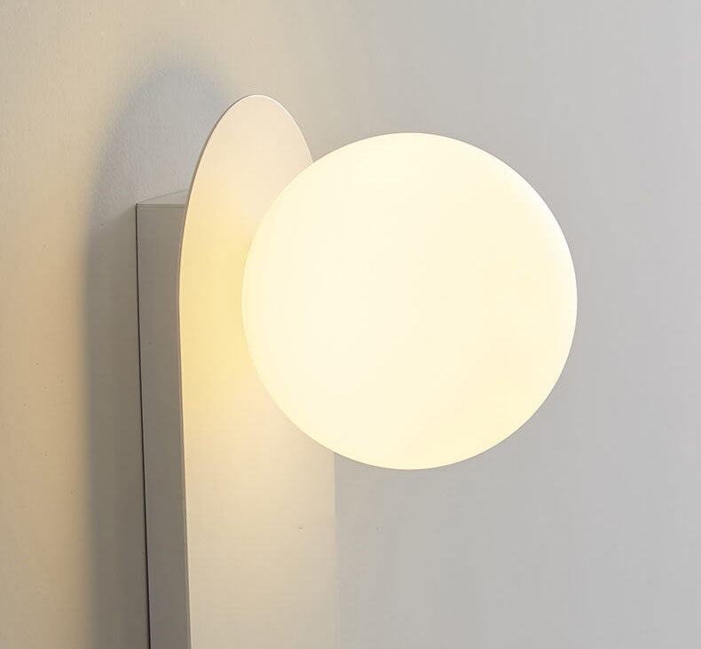 Minimalist Nordic globe wall sconce with oval backplate by BROKLEN – view 9
