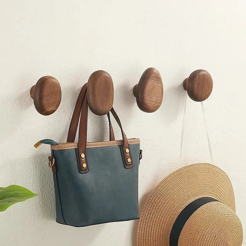 Set of four round pebble shaped wooden wall hooks by BROKLEN – view 4