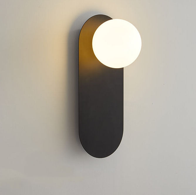 Minimalist Nordic globe wall sconce with oval backplate by BROKLEN – view 10