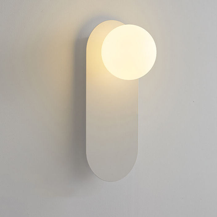 Minimalist Nordic globe wall sconce with oval backplate by BROKLEN – view 11