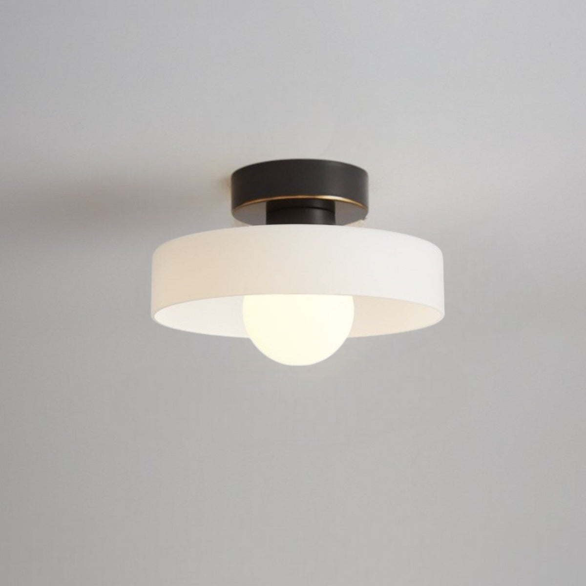 Bauhaus ceiling light with layered glass shade and globe by BROKLEN