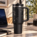 Midnight Celestial Tumbler - black insulated tumbler with moon and star print, front view
