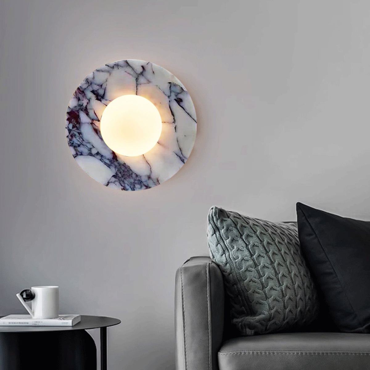 Marble wall light with round backplate and frosted globe shade by BROKLEN