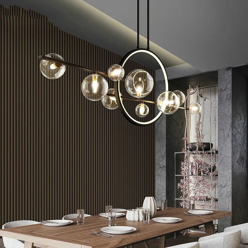 Clear glass linear kitchen table chandelier by BROKLEN – view 3