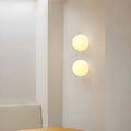 Modern frosted glass globe wall lamp by BROKLEN