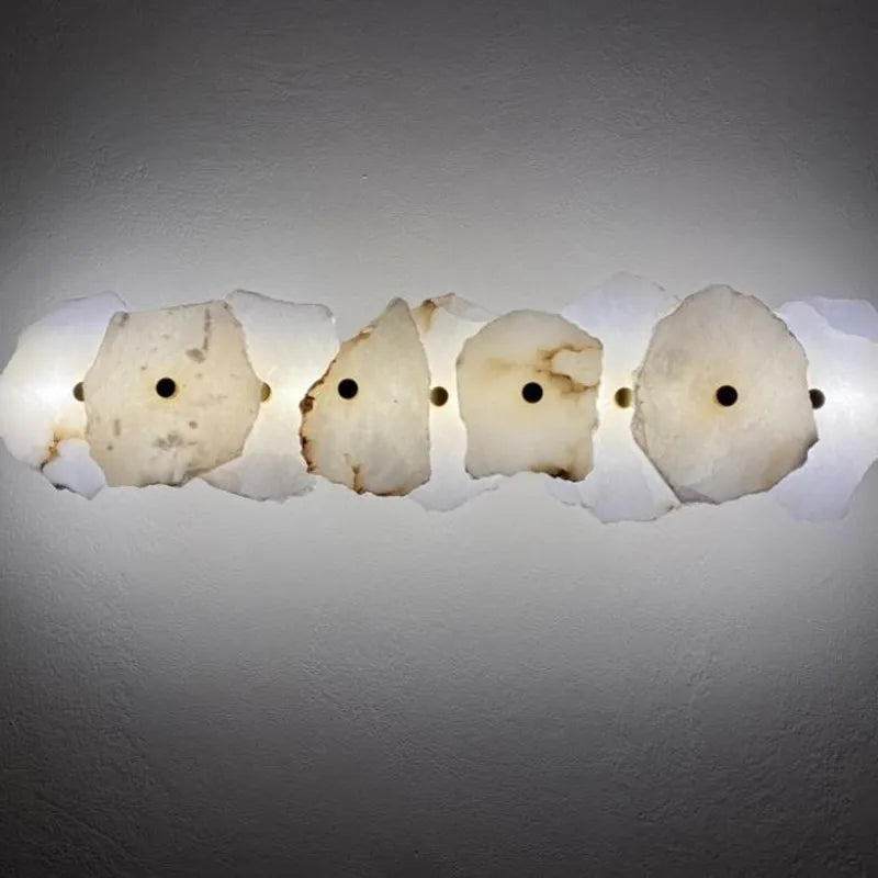 Organic stone shaped LED wall sconce by BROKLEN – view 3