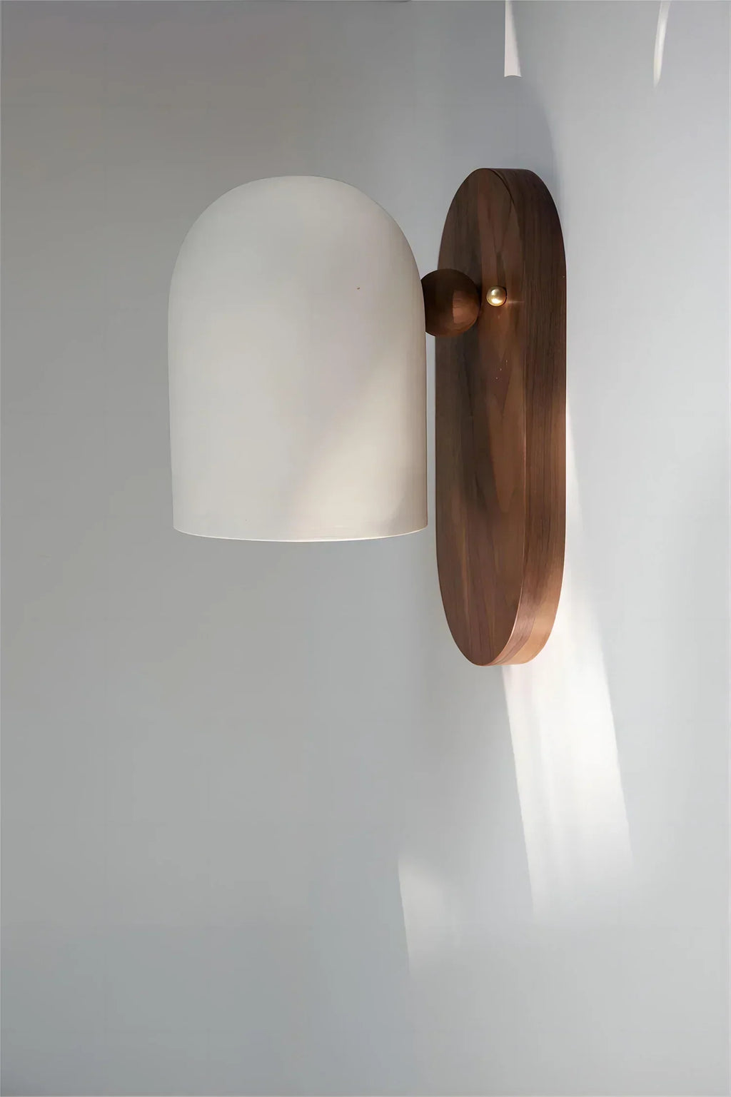 Walnut wood and iron linear wall sconce by BROKLEN
