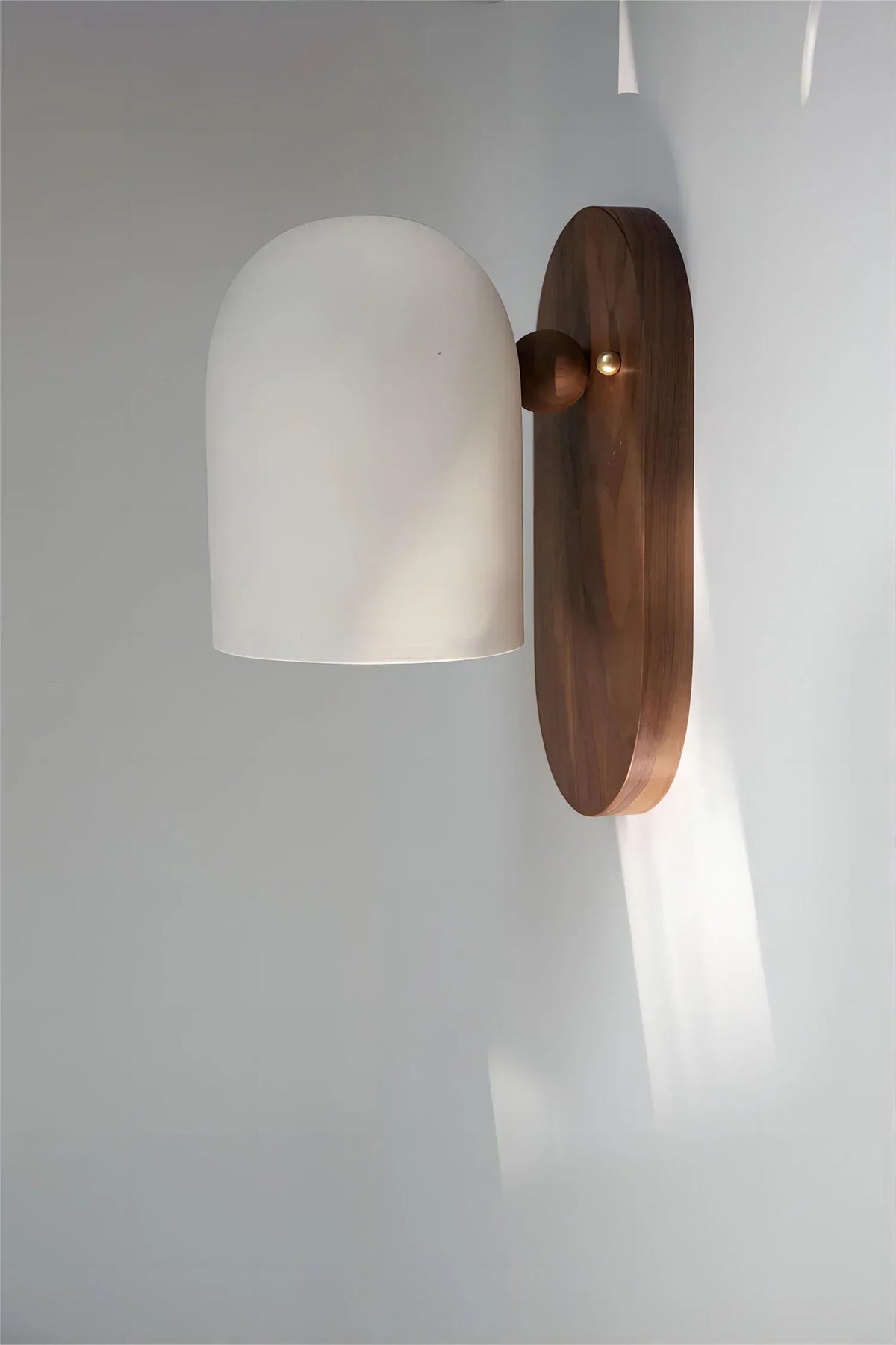 Walnut wood and iron linear wall sconce by BROKLEN