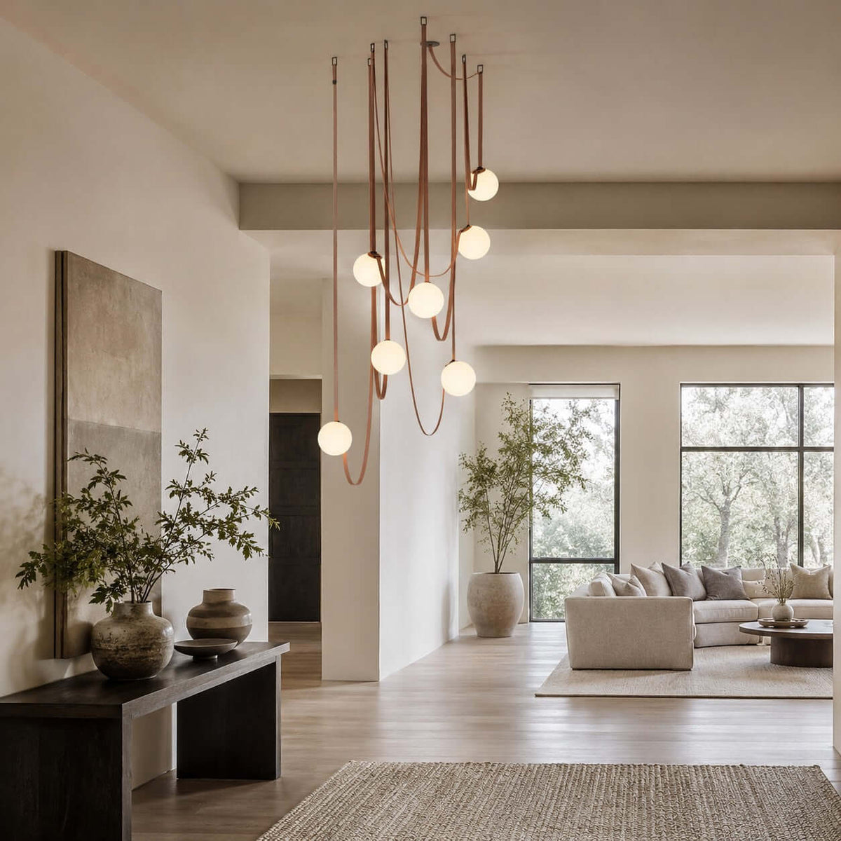 Cascading frosted glass globe chandelier with leather straps by BROKLEN – view 4