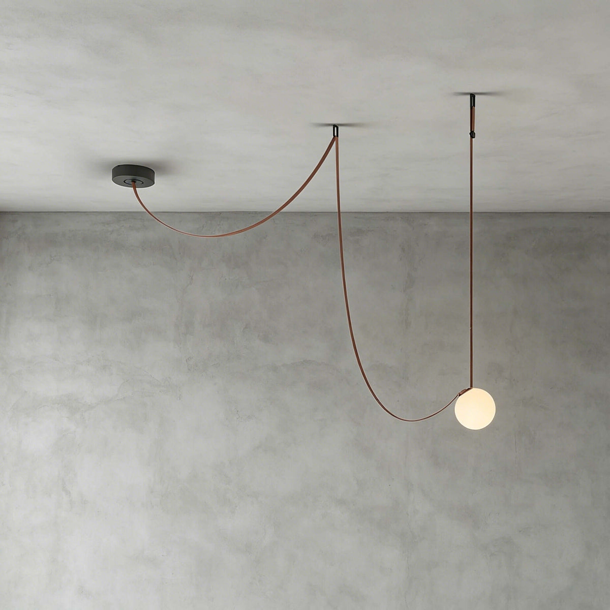 Cascading frosted glass globe chandelier with leather straps by BROKLEN – view 17