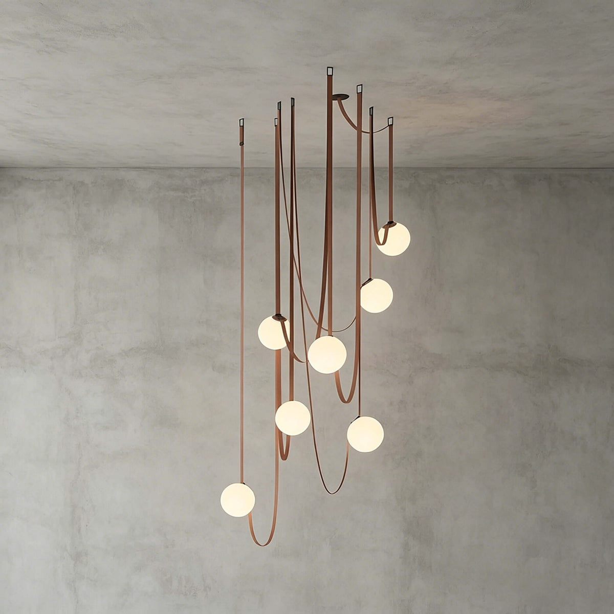 Cascading frosted glass globe chandelier with leather straps by BROKLEN – view 19
