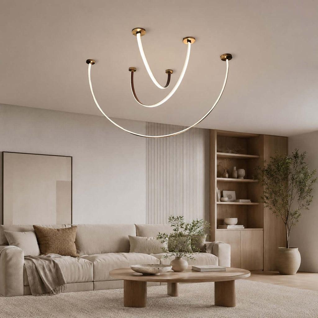 Curved linear LED chandelier with leather details by BROKLEN – view 14