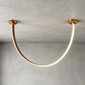 Curved linear LED chandelier with leather details by BROKLEN – view 16