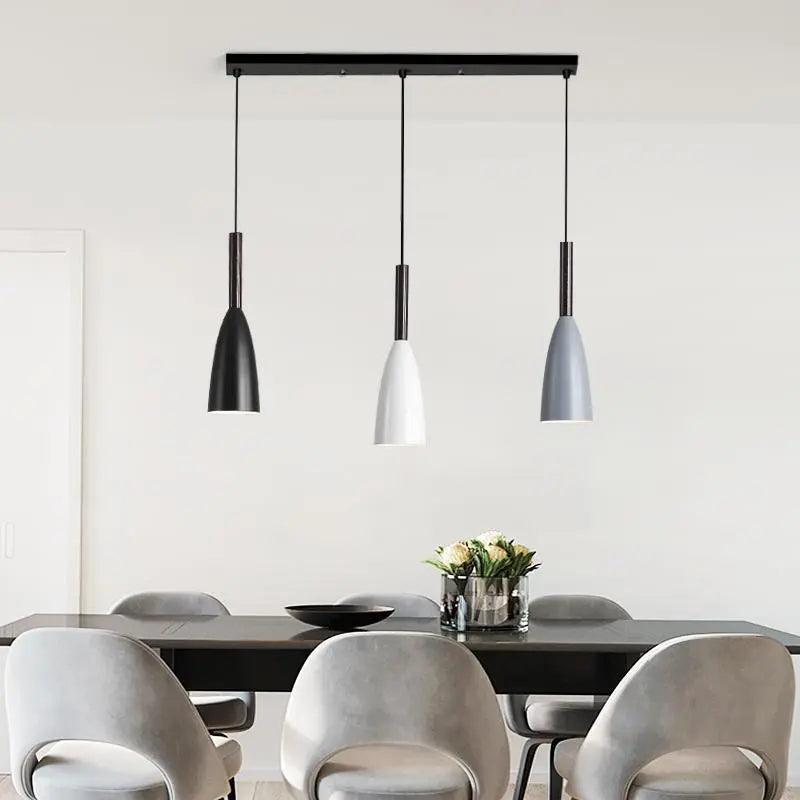 Three-light kitchen ceiling pendant with tapered metal shades by BROKLEN
