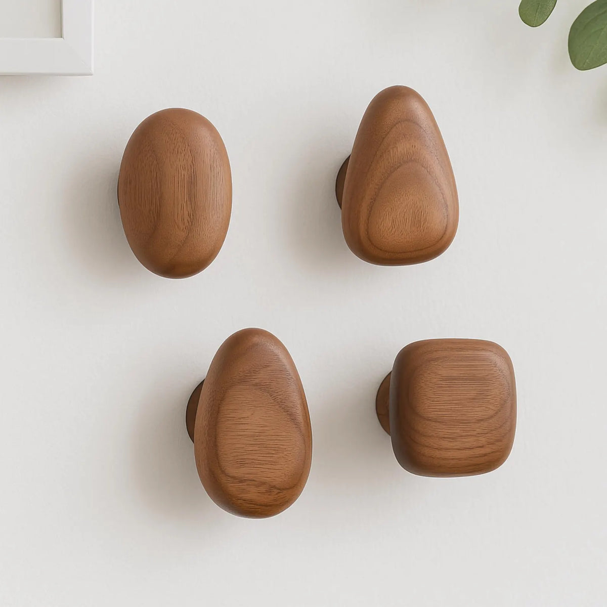 Set of four round pebble shaped wooden wall hooks by BROKLEN – view 5