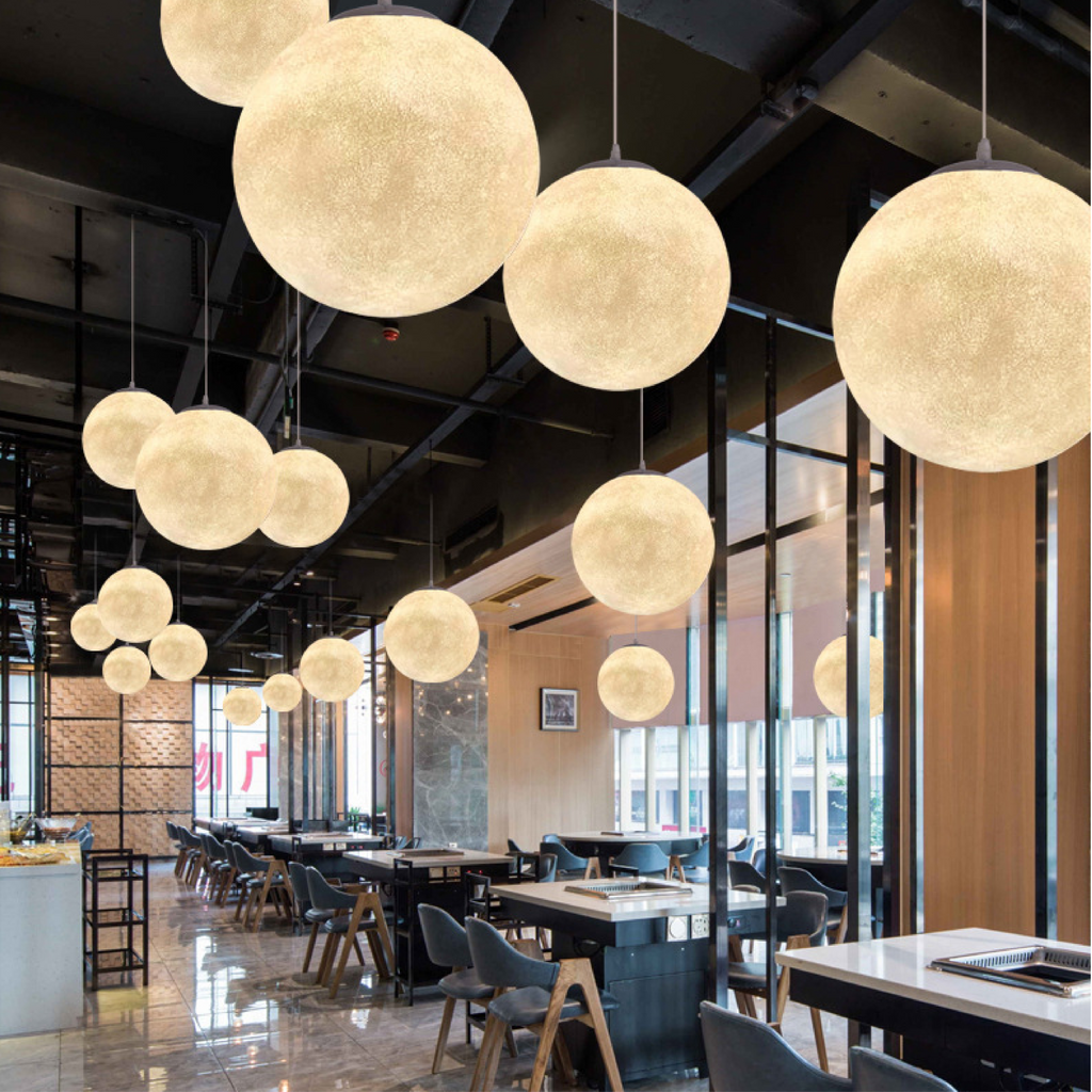 Lunar Glow moon pendant light in resin and fibre by BROKLEN