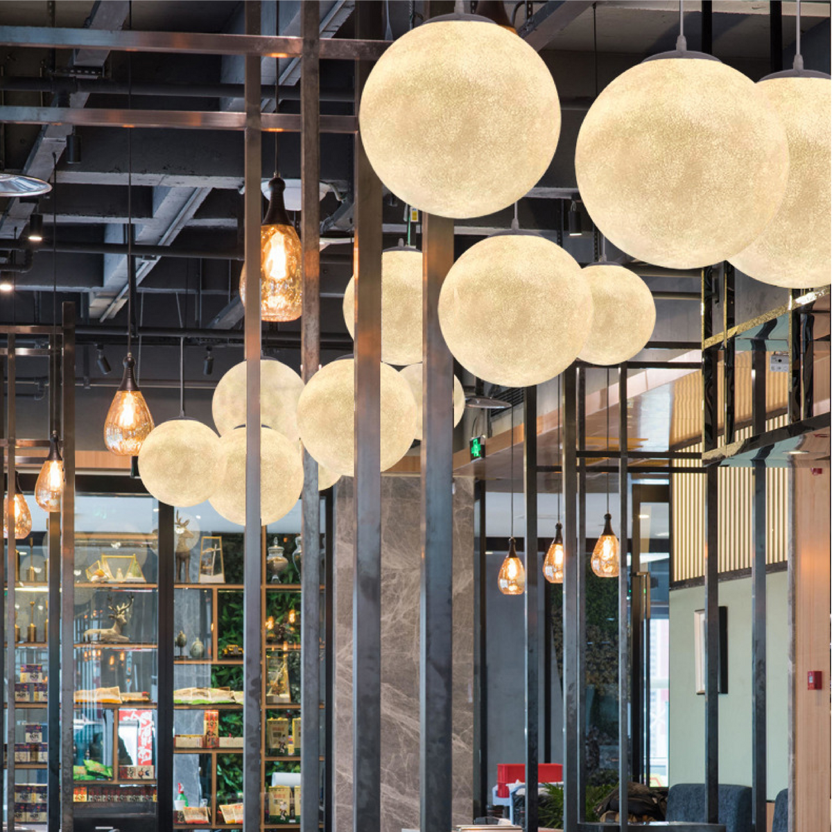 Lunar Glow moon pendant light in resin and fibre by BROKLEN – view 7
