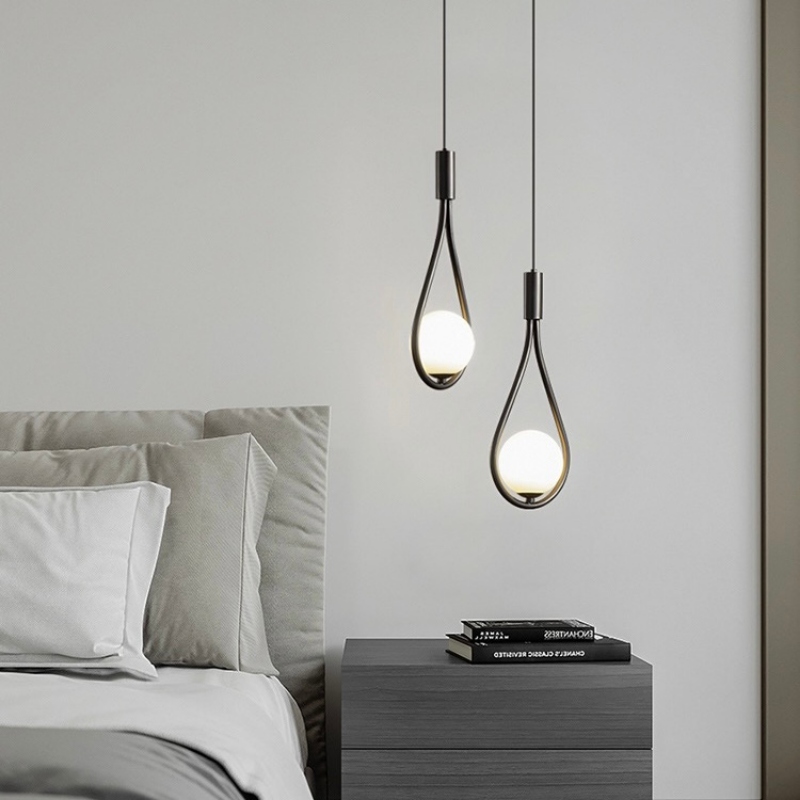 Contemporary minimalist LED pendant light in black and gold by BROKLEN