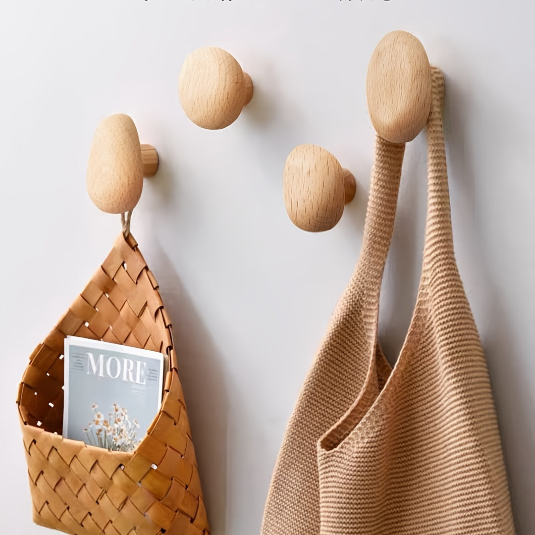 Set of four round pebble shaped wooden wall hooks by BROKLEN – view 7