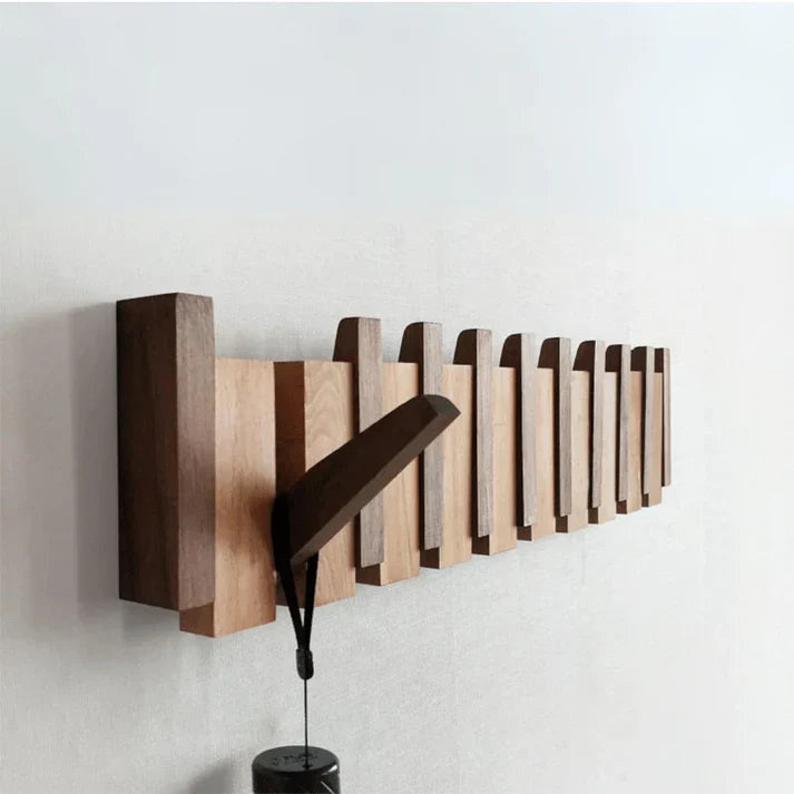 Wall mounted wooden coat rack with piano key design by BROKLEN