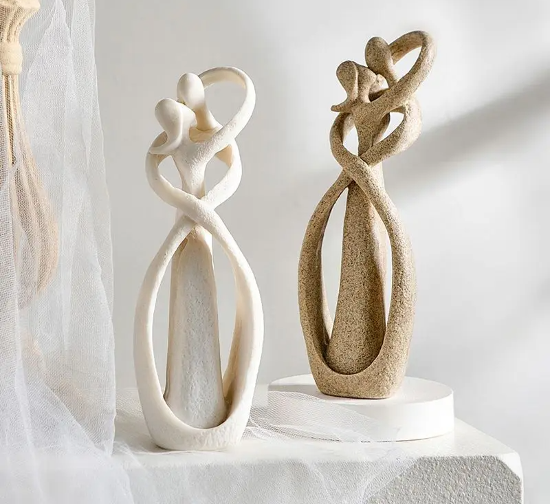 Abstract embracing couple love sculpture by BROKLEN – view 2