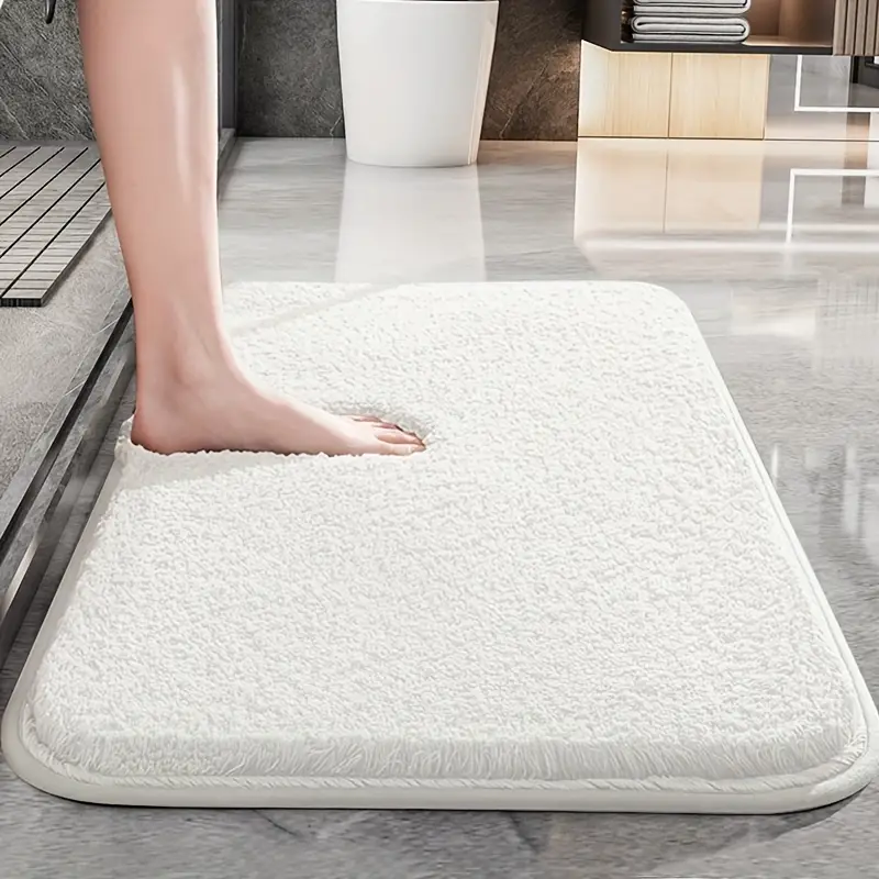 Soft plush anti-slip bath mat with rounded corners by BROKLEN